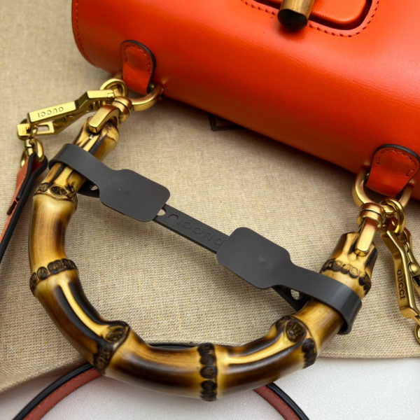 G*u*i small top handle bag with bamboo