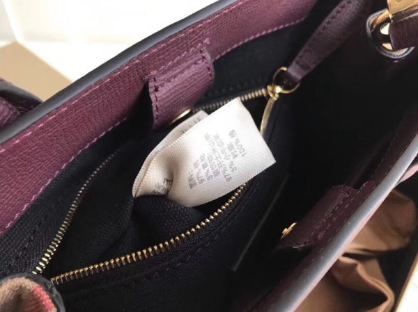 B**rry the small banner in leather and house check