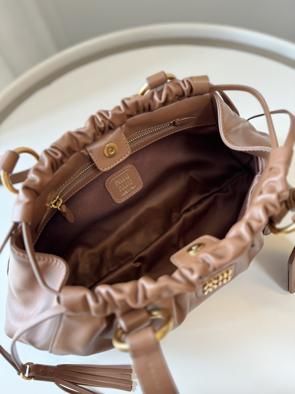 M*um*u joie nappa leather bag