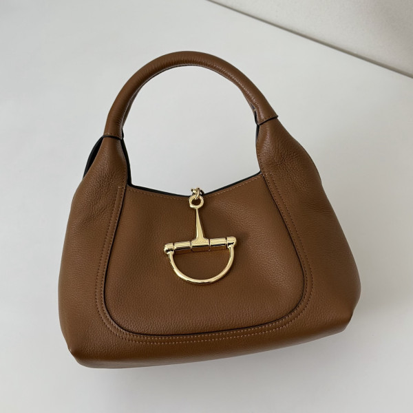 G*u*i softbit medium top handle bag